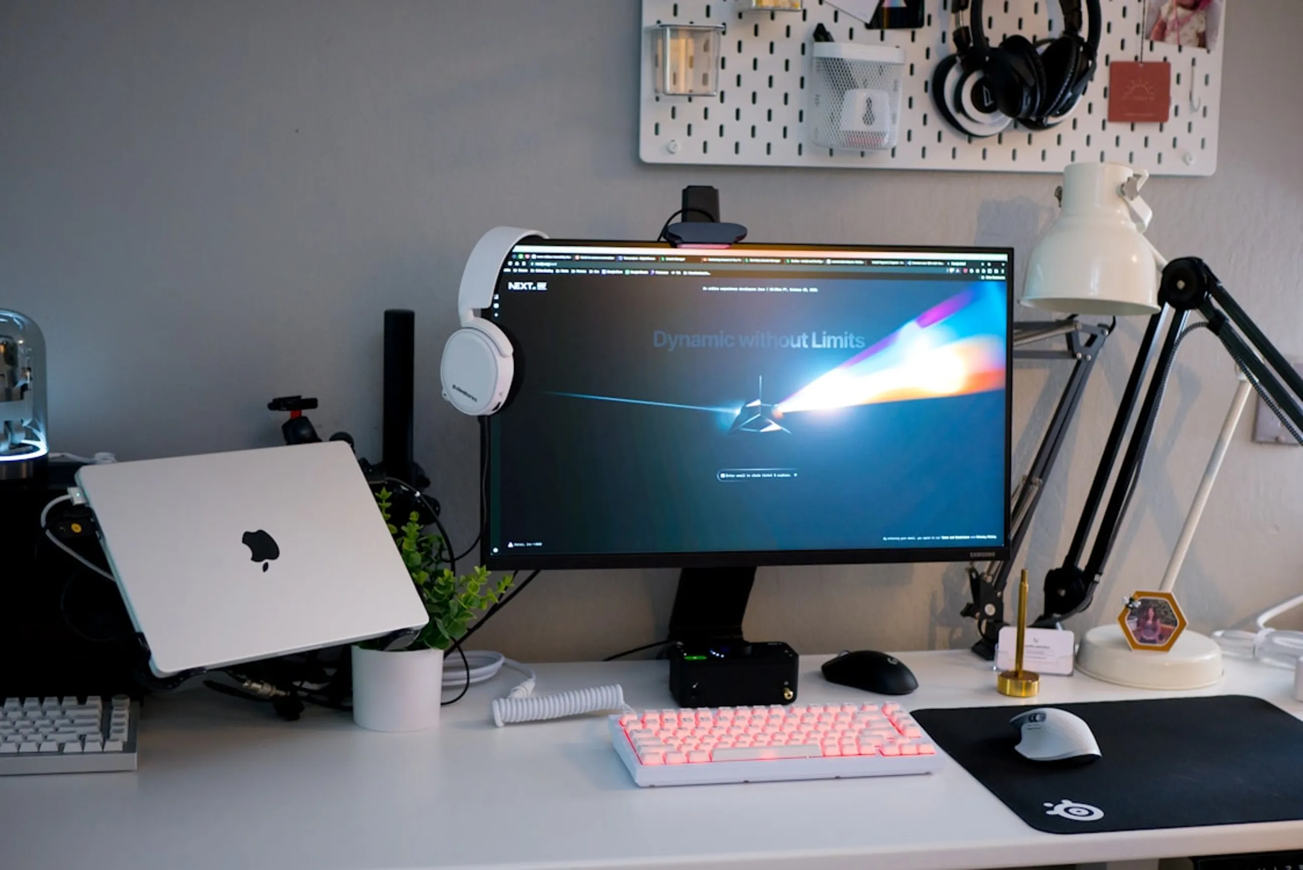 desk setup with monitor and laptop