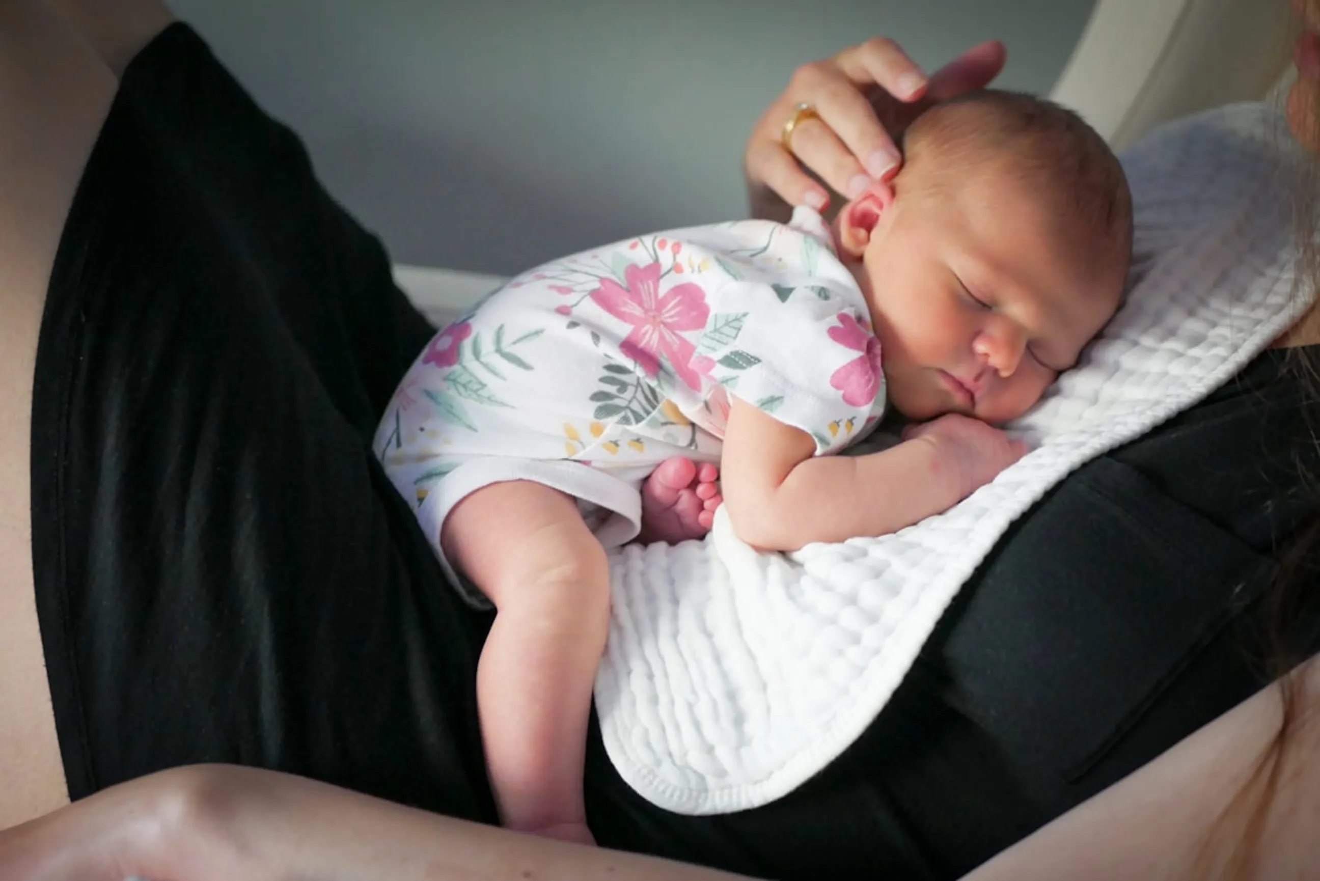 woman holding a baby in her arms